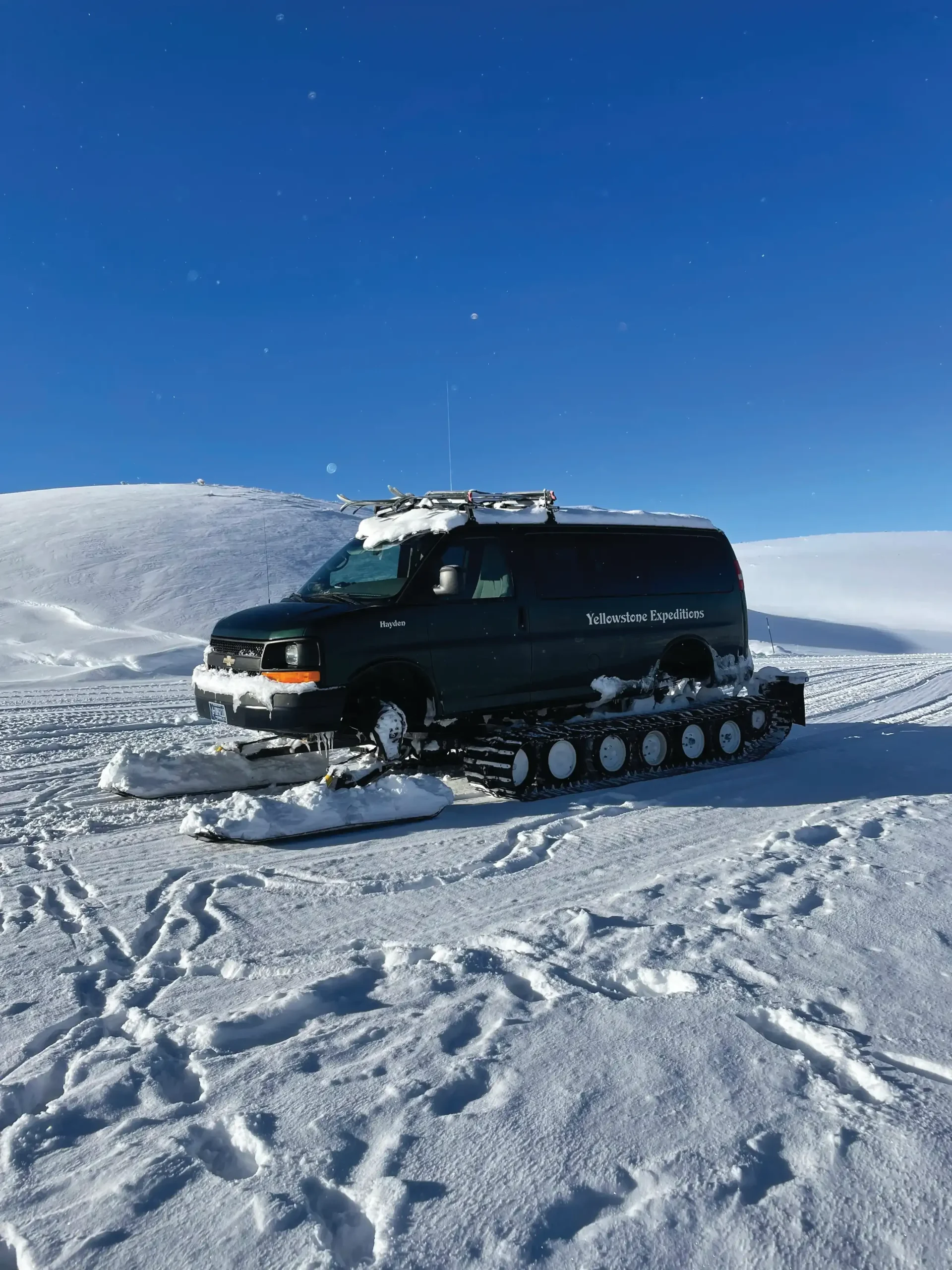 Yellowstone Expeditions snowcoach with track conversion kit