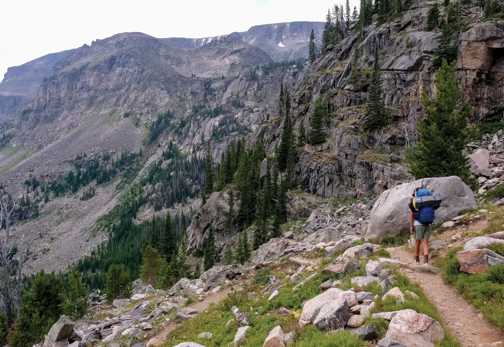 The Shifting Wild of Adventuring with Kids 2 A steep trail winding through mountains toward Glacier Lake