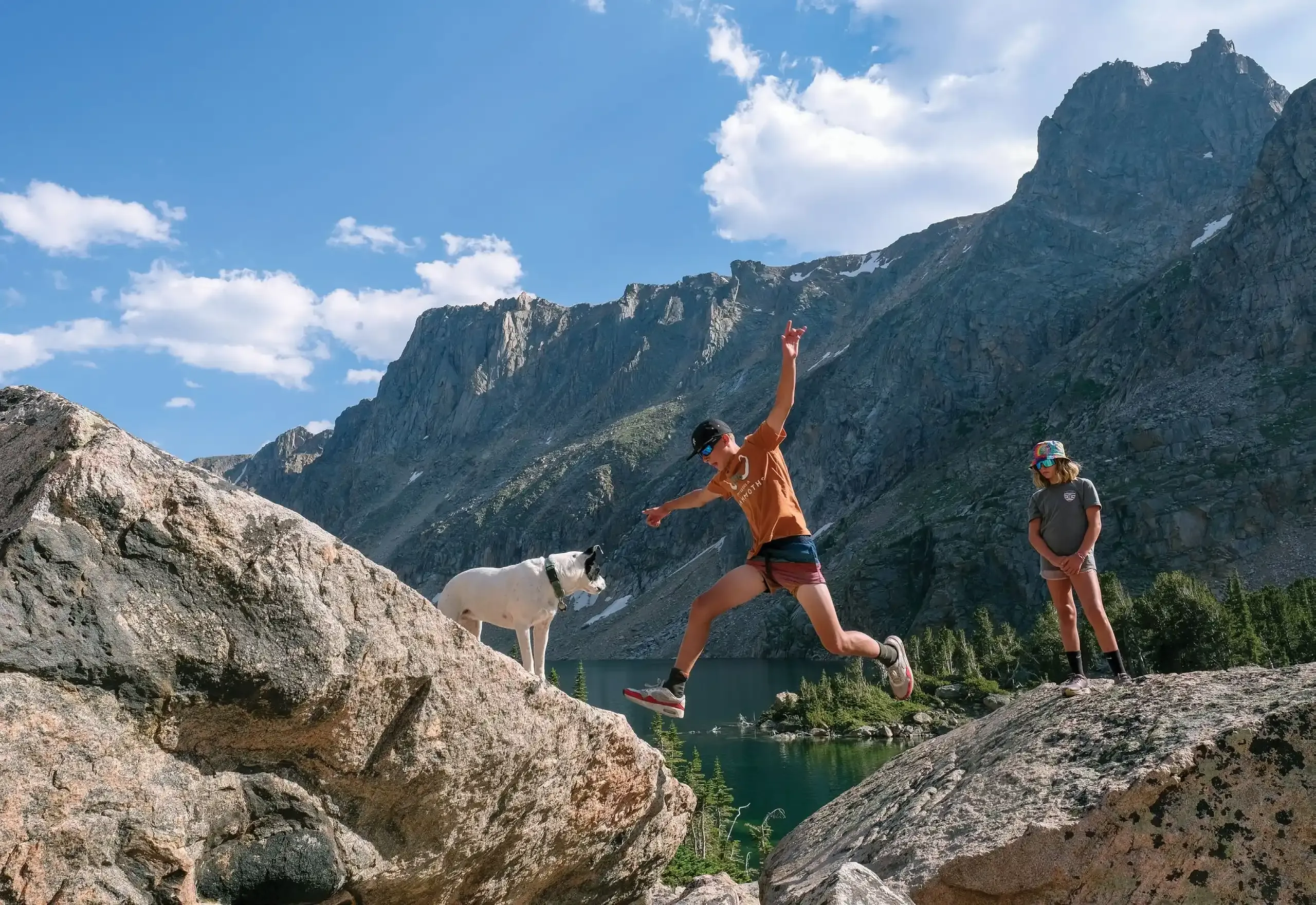 The Shifting Wild of Adventuring with Kids 5 Lachlan leaping between boulders in a scree field at Glacier Lake