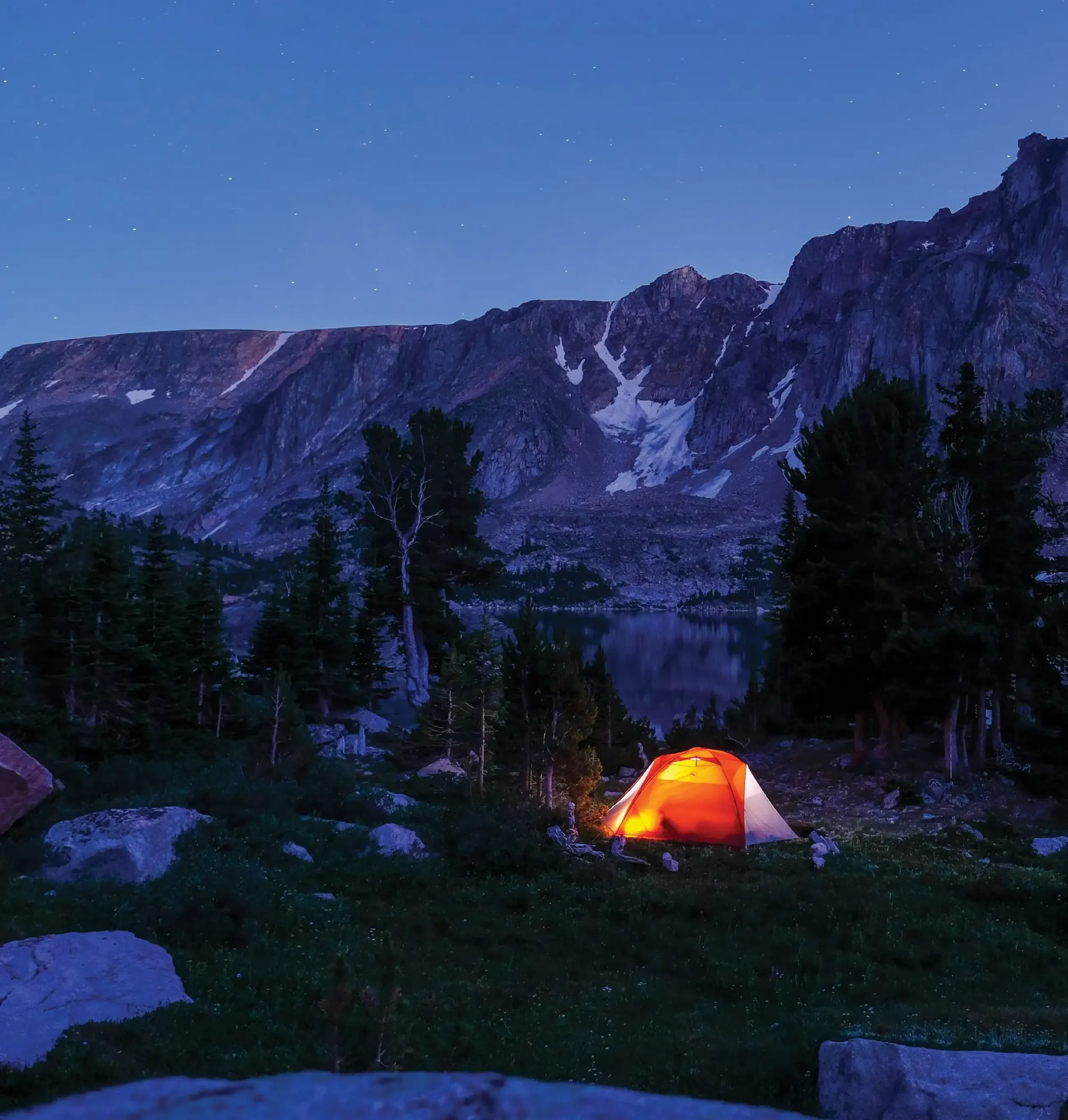 The Shifting Wild of Adventuring with Kids 8 Stars emerging in the twilight sky above Glacier Lake