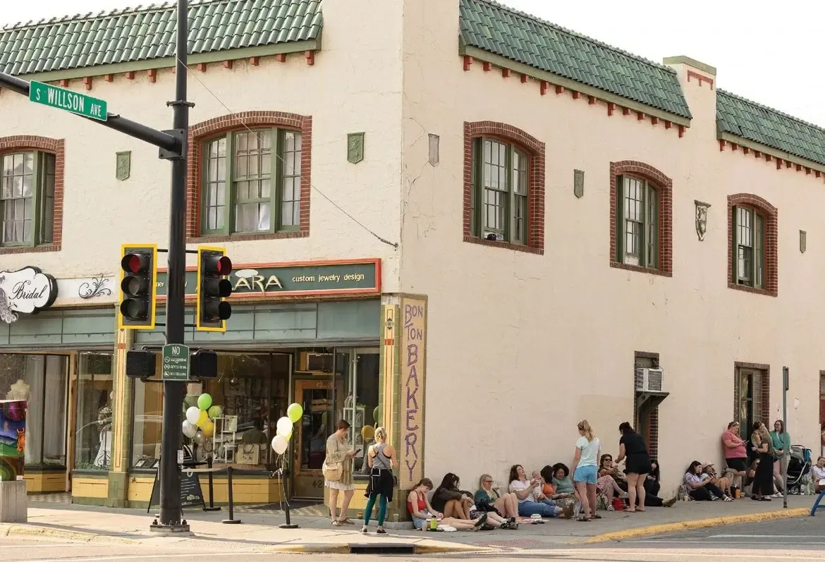 Not Just Jewelry 2 The Alara Jewelry storefront on a downtown Bozeman corner with people gathered along the sidewalk