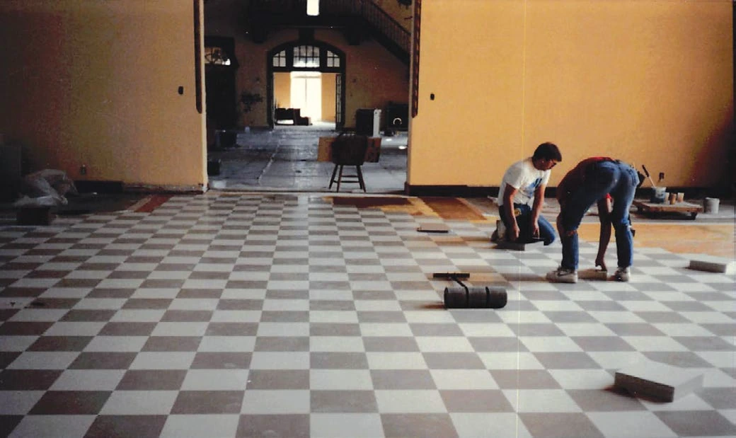 Gallatin Gateway Inn 9 Workers remodeling the checkered floor at the Gallatin Gateway Inn