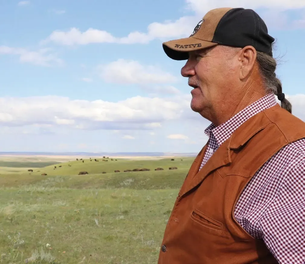 The Guardians of the Last Best Place 5 Robbie Magnan looking out over the prairie on the Fort Peck Reservation