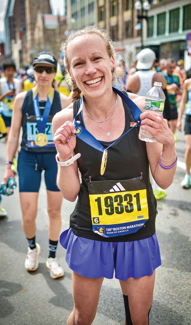 More Than 26.2 Miles 5 Kaley Burns poses with her finisher's medal after her first Boston Marathon